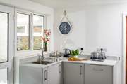 The kitchen has all you need to create a culinary delight.