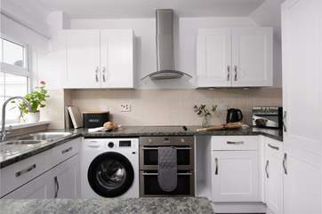 The kitchen is well-equipped.