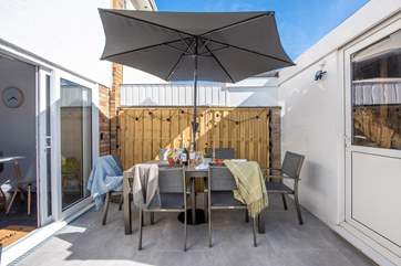 The patio is a lovely spot for your morning breakfast.