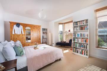 The dual-aspect double bedroom on the first floor is spacious and beautifully furnished.