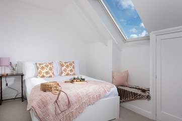 Bedroom 3 is on the second floor, a glorious Velux lets the light flood in.
