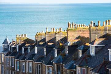 The enchanting view over Victorian rooftops towards the sea.