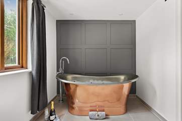 Imagine relaxing in this resplendent bath!