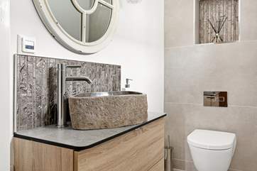 Even the downstairs cloakroom is super swish.