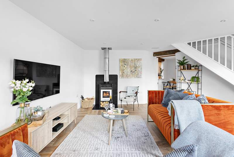 With a Smart TV, Sonos sound system and a stylish wood-burner, the sitting-room is the perfect place to relax.