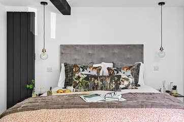 Beautiful soft furnishings fill both bedrooms.