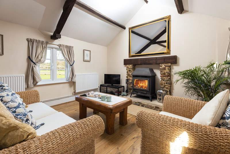 The cosy sitting/dining-room has a gorgeous wood-burner to keep you warm throughout the year.