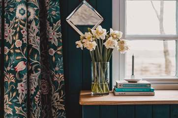 The warm woody tones, mixed with the rich paint pallet and beautiful materials, really add to the character of this magical shepherd's hut.