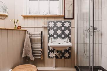 The shower-room is idyllic for freshening up after a day at the beach.