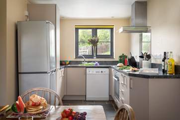 The modern kitchen is well-equipped.