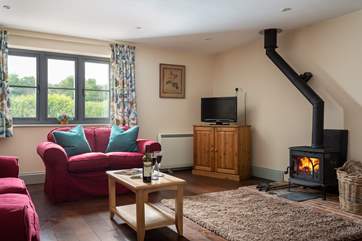 Natural light floods into the spacious sitting-room.