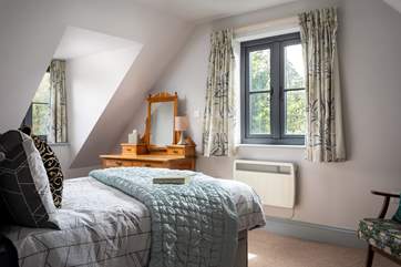Wake to the glorious morning sun in bedroom one.