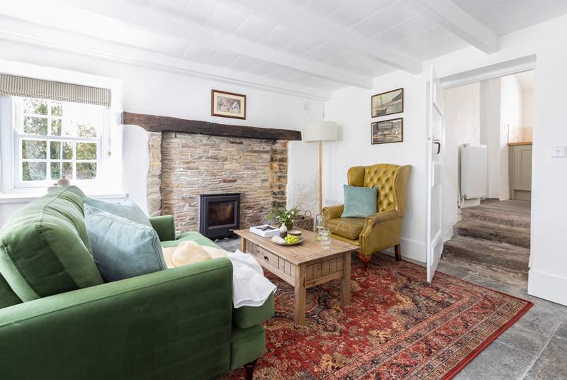The snug has a feature fireplace and the all important wood-burner.