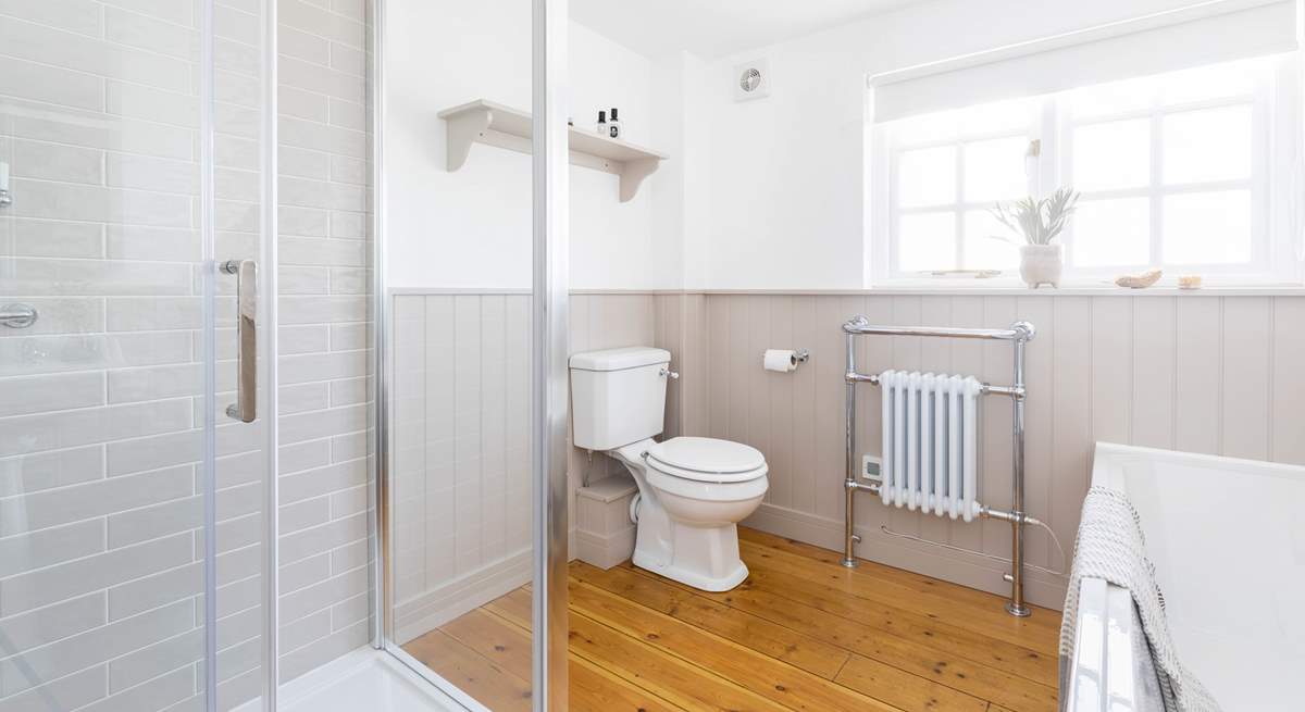 The main bathroom, perfect for a relaxing soak after a busy day.