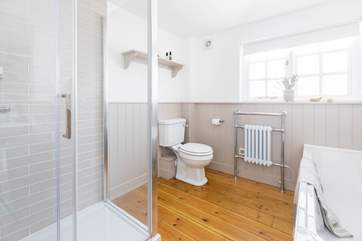The main bathroom, perfect for a relaxing soak after a busy day.