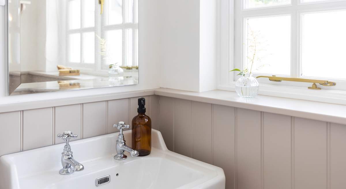 Muted pastel shades in the shower-room.