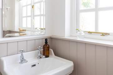 Muted pastel shades in the shower-room.