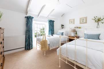 Bedroom 2 is a spacious twin bedroom.