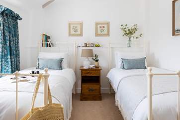 Sweet dreams in this pretty bedroom.