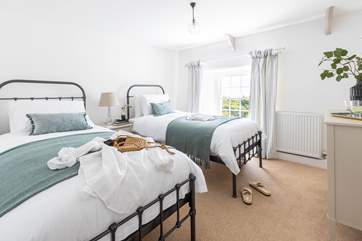 Bedroom 3 is a delightful twin bedroom.