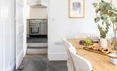 Two steps lead from the kitchen into the dining-room. - Thumbnail Image