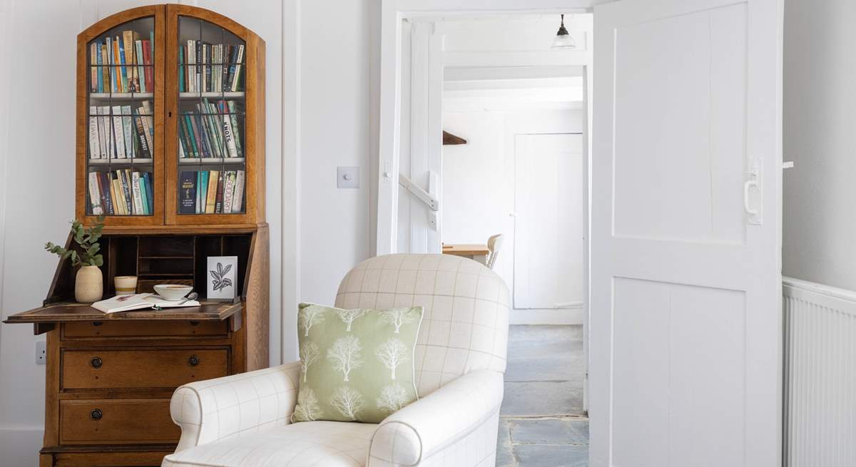 Characterful slate floors run through the kitchen and dining-room.