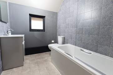 The sleek bathroom is modern and stylish.
