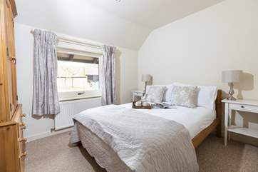 Relax in this tranquil bedroom.
