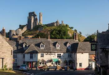 Glorious Corfe Castle rising up behind the village.
