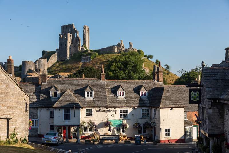 Glorious Corfe Castle rising up behind the village.