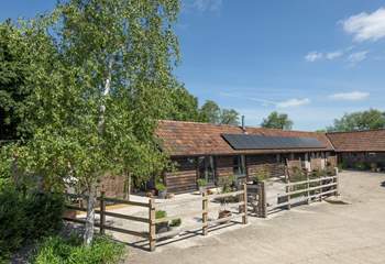Solar panels and a biomass boiler make Park Farm Byre an eco property to stay in.