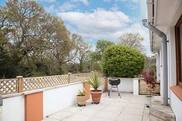 Fancy a barbeque? This terrace is accessed from the utility area with lovely views over the garden.