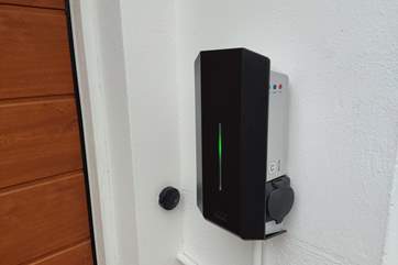 There is an EV charger on the drive way which is very handy.