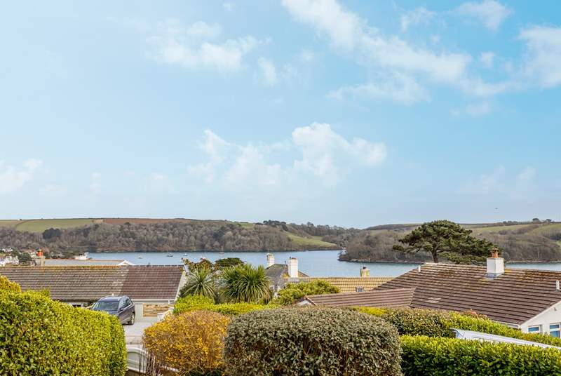 The panoramic view from the front garden looks out over St Mawes harbour to Place, St Anthony and beyond as far as Helford and the Lizard peninsula.