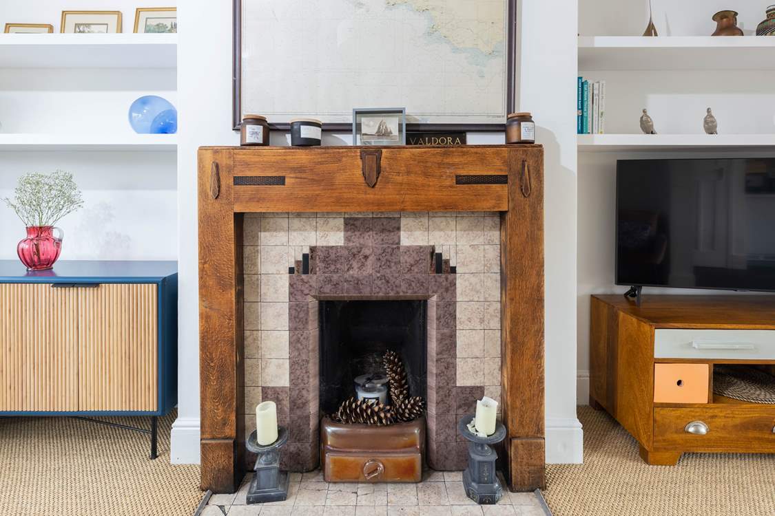 The ornamental fireplace in the living-room.