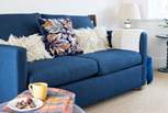 The open plan living space has gorgeous comfy sofas.