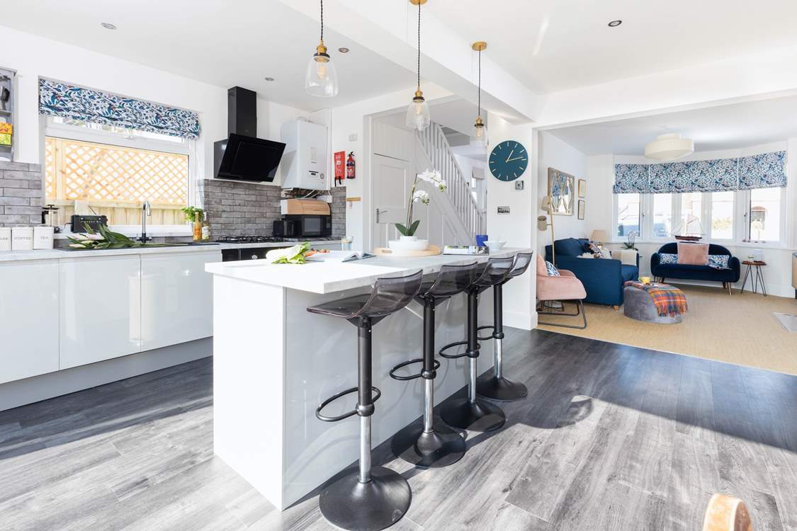 Perch at the island in the kitchen and chat about your plans for the day.