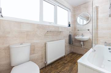 The large family bathroom is perfect for washing those sandy feet.