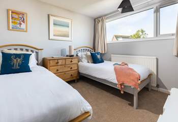 The twin bedroom overlooking the garden is perfect for the children to share.