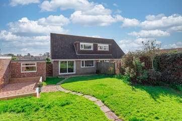 A lovely family size enclosed garden with terrace area for outside dining.
