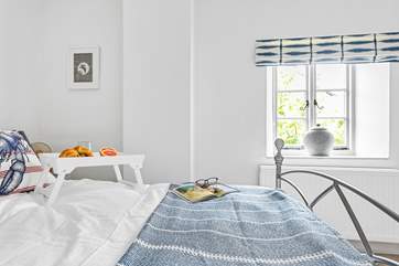 Each bedroom is beautifully furnished.