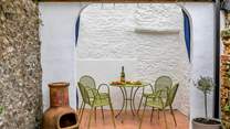 Enjoy the Mediterranean vibe of the courtyard.