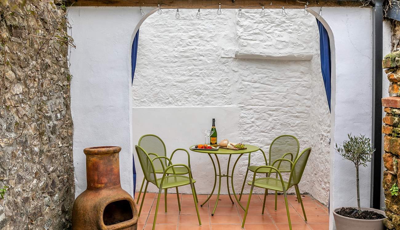 Enjoy the Mediterranean vibe of the courtyard.