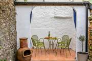 Enjoy the Mediterranean vibe of the courtyard.