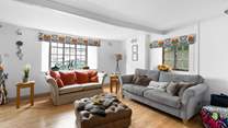 Relax on the super comfy sofas and enjoy an evening of entertainment on the Smart TV.
