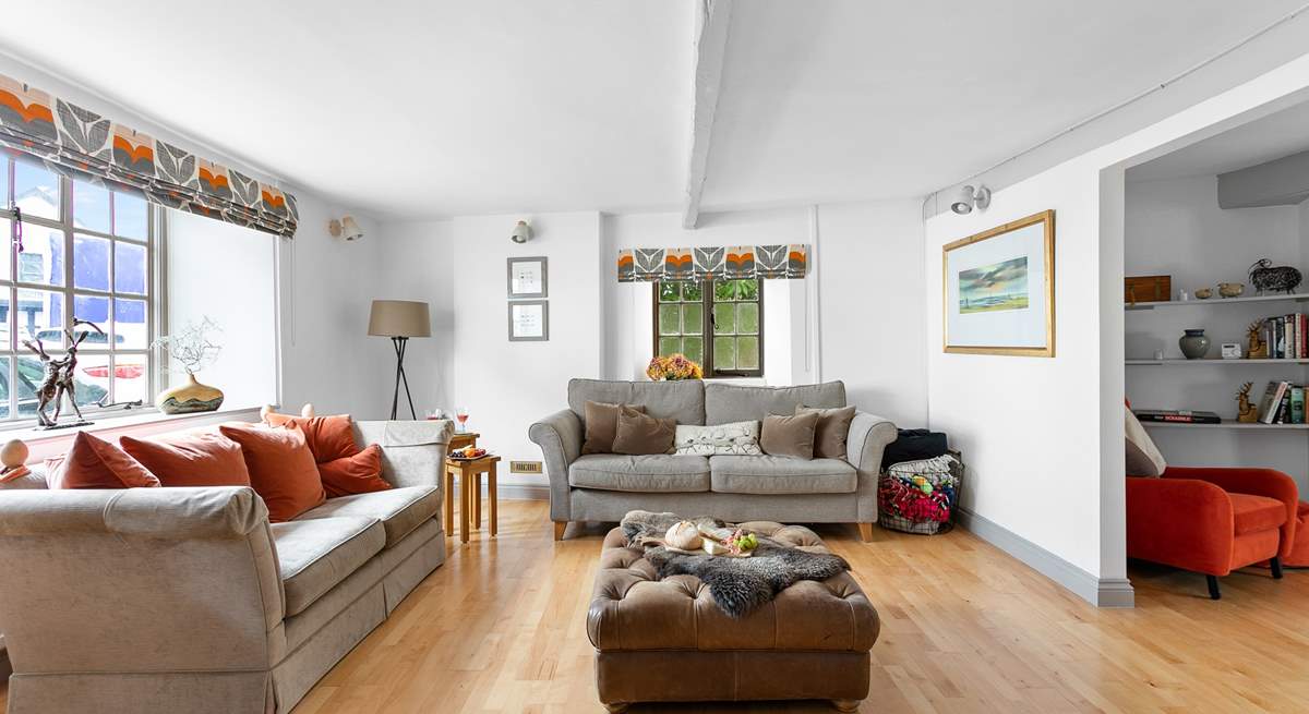 This super spacious living space leads into the dining-room.