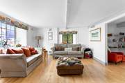 This super spacious living space leads into the dining-room.