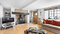 The feature fireplace has a fabulous wood-burner to keep you toasty throughout the year.