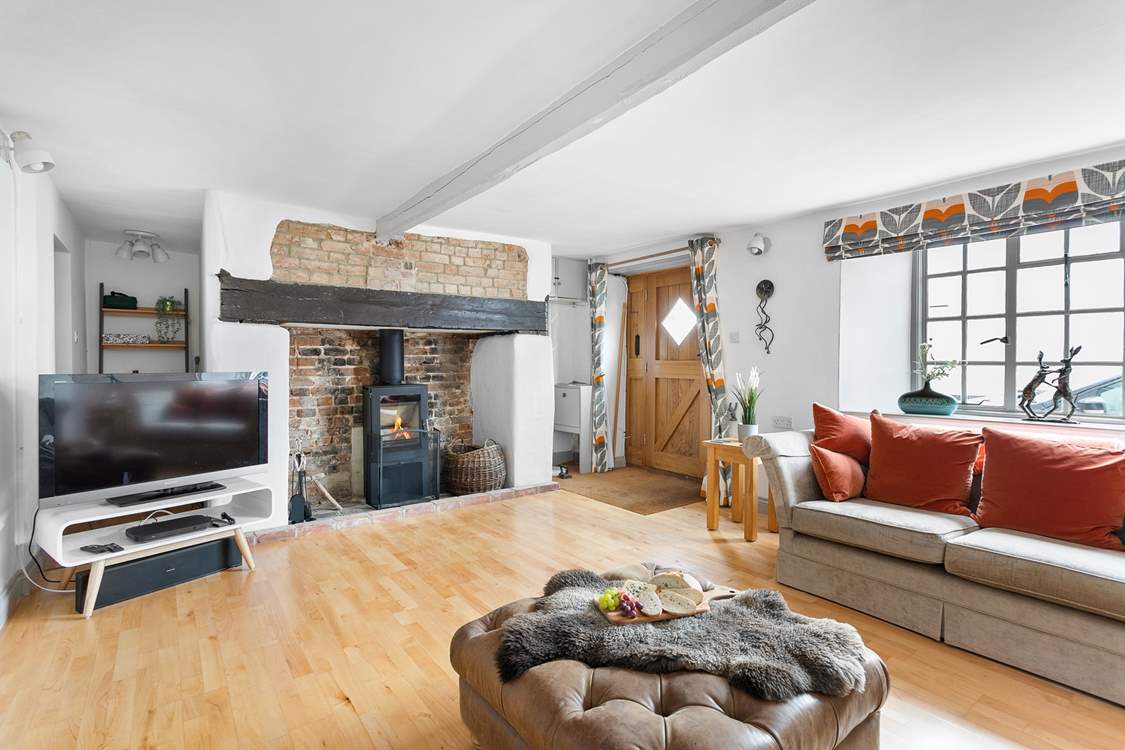The feature fireplace has a fabulous wood-burner to keep you toasty throughout the year.