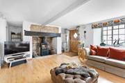 The feature fireplace has a fabulous wood-burner to keep you toasty throughout the year.